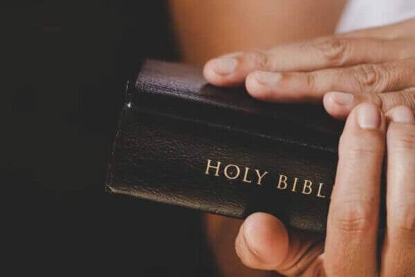 Holding Bible Holding Bible